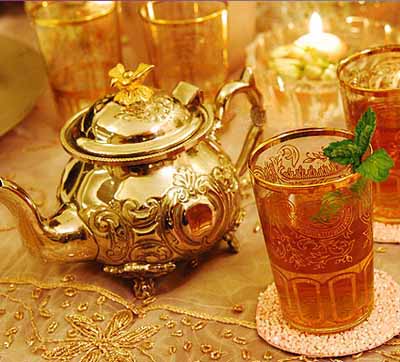 glass with mint and golden teapot for Arabian Nights theme party table decoration 