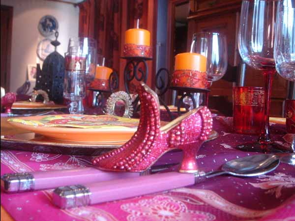 pink shoe decorated with glass beads table centerpiece idea