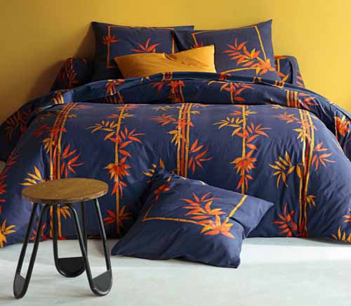 Flower Beds in blue and orange color provides modern bedroom color trends