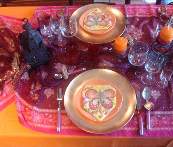 Moroccan style party table with golden plates