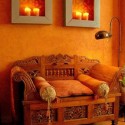 Moroccan furniture and decor accessories and orange wall paint