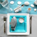 white and turquoise tablecloth napkins and dishes for table-setting