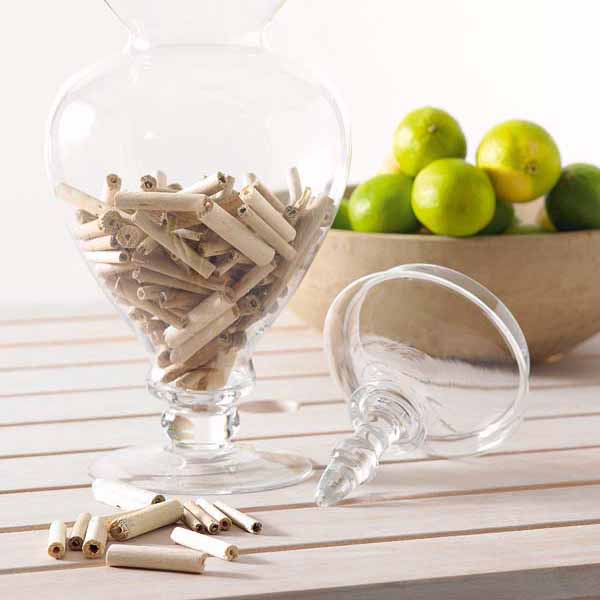 driftwood in glass vase is unique table centerpiece and home decoration