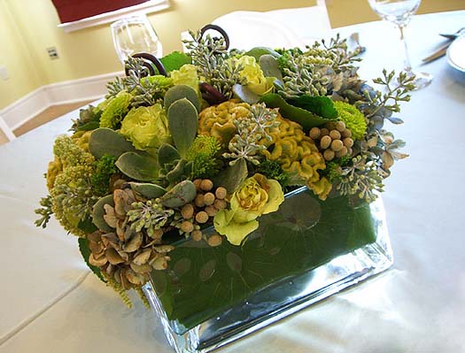 green leaves and yellow flowers are beautiful centerpiece ideas for eco homes