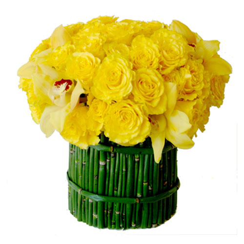 short green bamboo sticks and yellow roses are eco friendly table centerpiece ideas