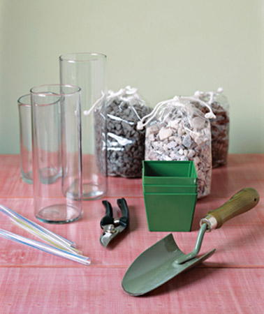 diy flower centerpiece ideas with rocks and beach pebbles