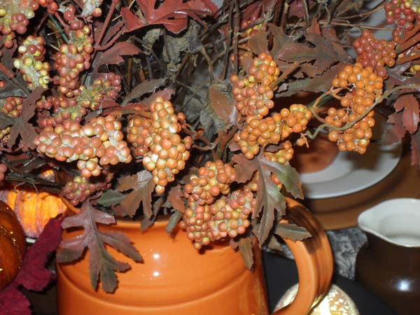 Branches with berries for Thanksgiving table decoration