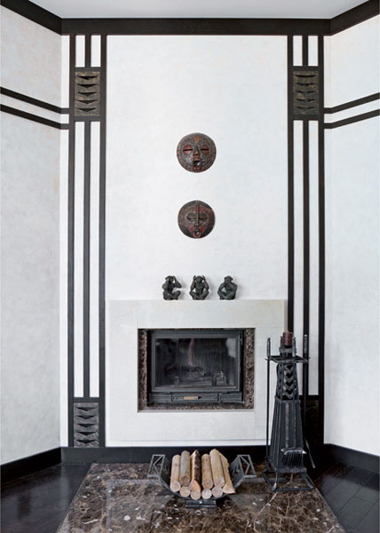 fireplace and wall decoration with indonesian art and handicrafts