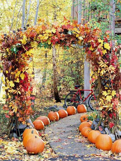 Garden Path Halloween decoration with pumpkins and autumn leaves