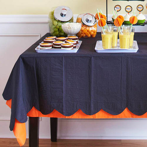 creative halloween ideas for kids and party table decoration with colorful dishes and drinks