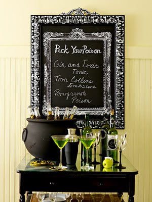 green or orange with black table decor for halloween party