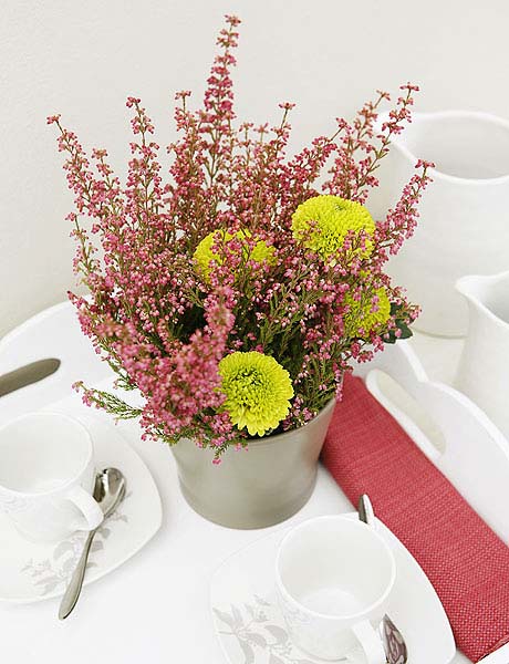pink heather flower arrangement for the table decorations