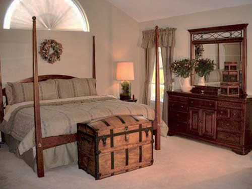 wooden chest and bed posts with colonial