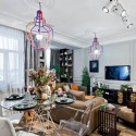interior decoration in eclectic style with unique lighting and French paintings