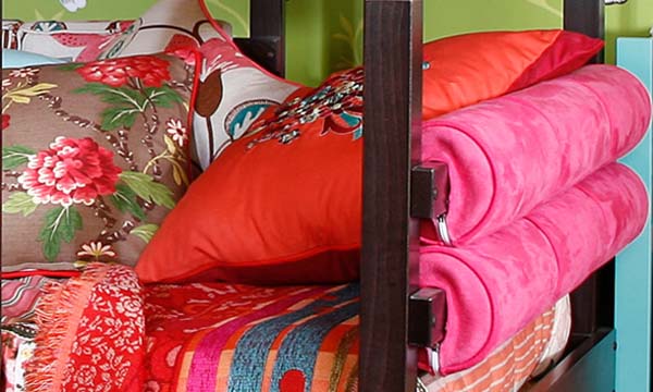 soft furnishing fabrics and pillows with floral patterns for girls bedroom decorating