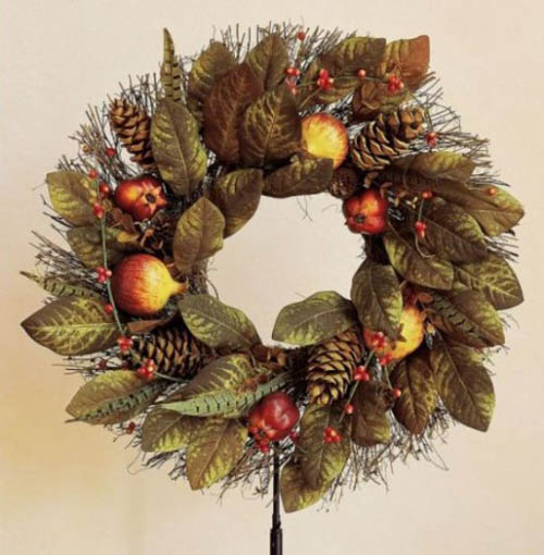 Wall or door wreath with apples and pine cones