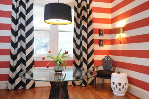 orage and black stripes on walls and curtains