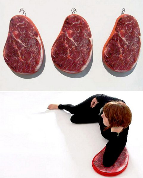 large cushions with red meat prints