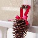 pine cones with red ribbon