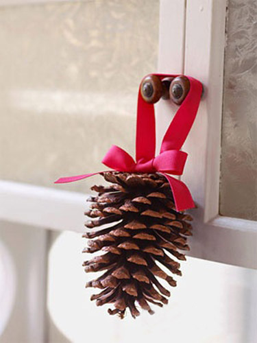 pine cones with red ribbon