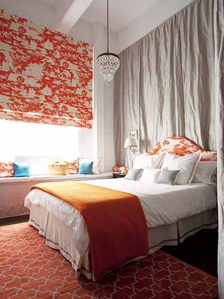 orange curtains, throw and bed upholstery fabric