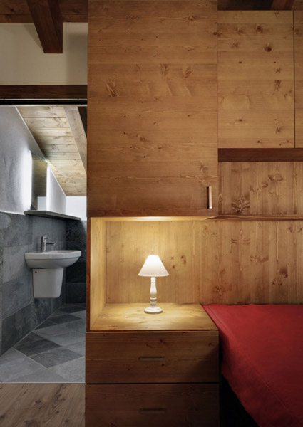 wooden walls and furniture in the bedroom