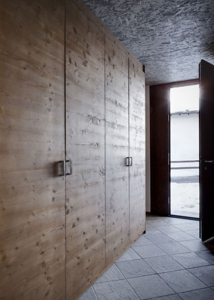 wooden storage cabinet and slate floor