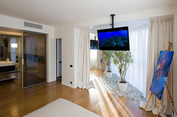 bedroom with beach stones on the ground