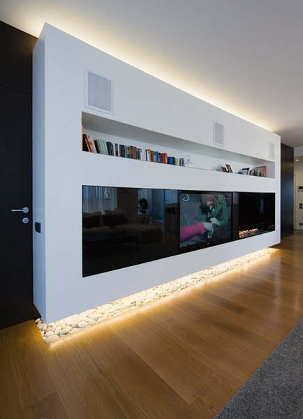 shelves and contemporary fireplace