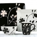 black and white decorative pillows and dishes