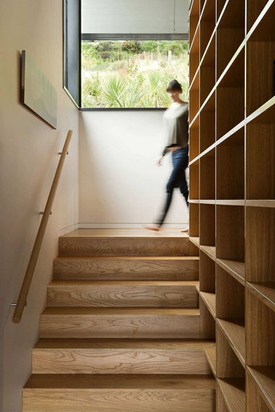 staircase with storage cabinet