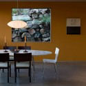 modern dining room with yellow walls and windows