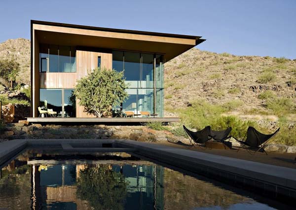 contemporary home with steel pool