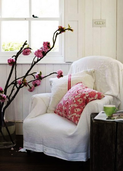 room decorating with flowering branches, room decor in white and pink colors