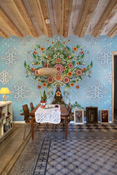 blue wallpaper with floral patterns
