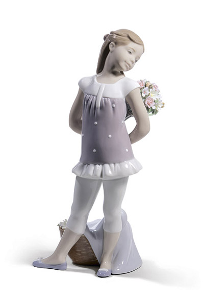 girl with flowers figurine