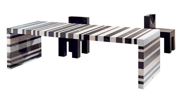 striped dining table made of natural stone blocks