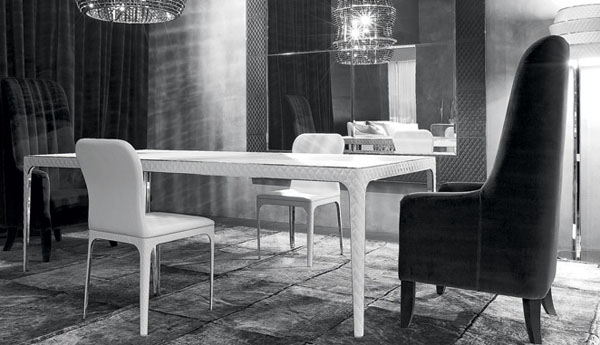dining tabl with white legs decorated with leather