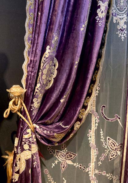purple curtains with gold and embroidery