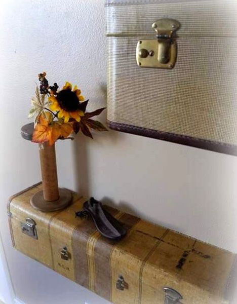 Wall shelves makes of suitcases