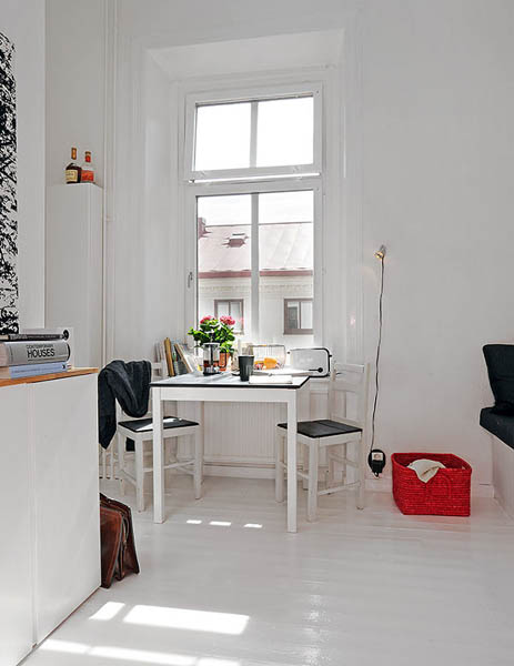 black and white decorating with red accents