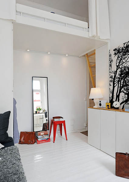 black and white wallpaper and red stool