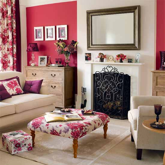 pink wall and white fireplace with rectangular wall mirror