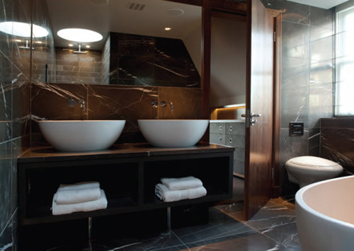 wooden furniture and round sinks