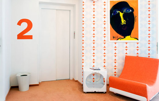 retro chair and walpaper in orange colors