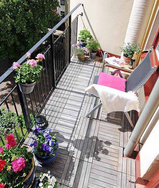 pink flowers and pink cushion for outdoor chair