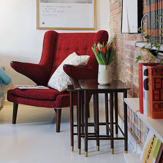 red chair and side table