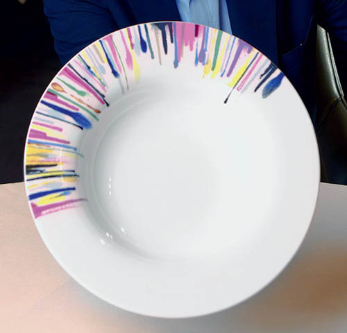 white plate with colorful stripes