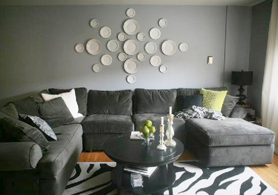 white plates in various sizes for decorating large wall