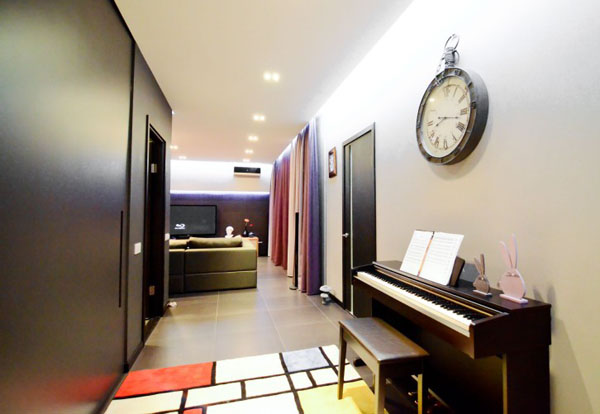 colorful floor rug and large wall clock